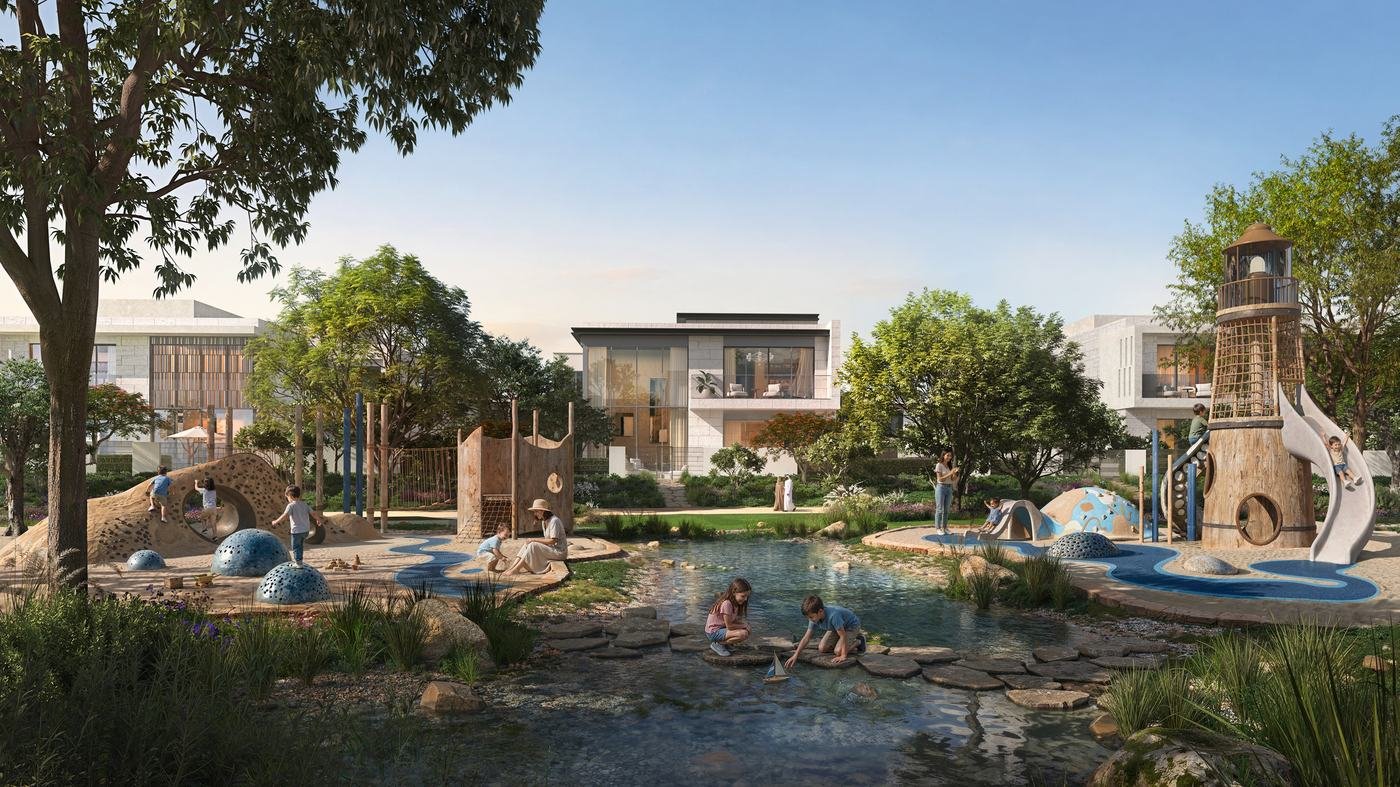 Landscaped community with water play and villas at Talay